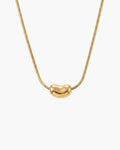 Nova Necklace, polished gold-tone bean-shaped pendant on a round snake chain, on white
